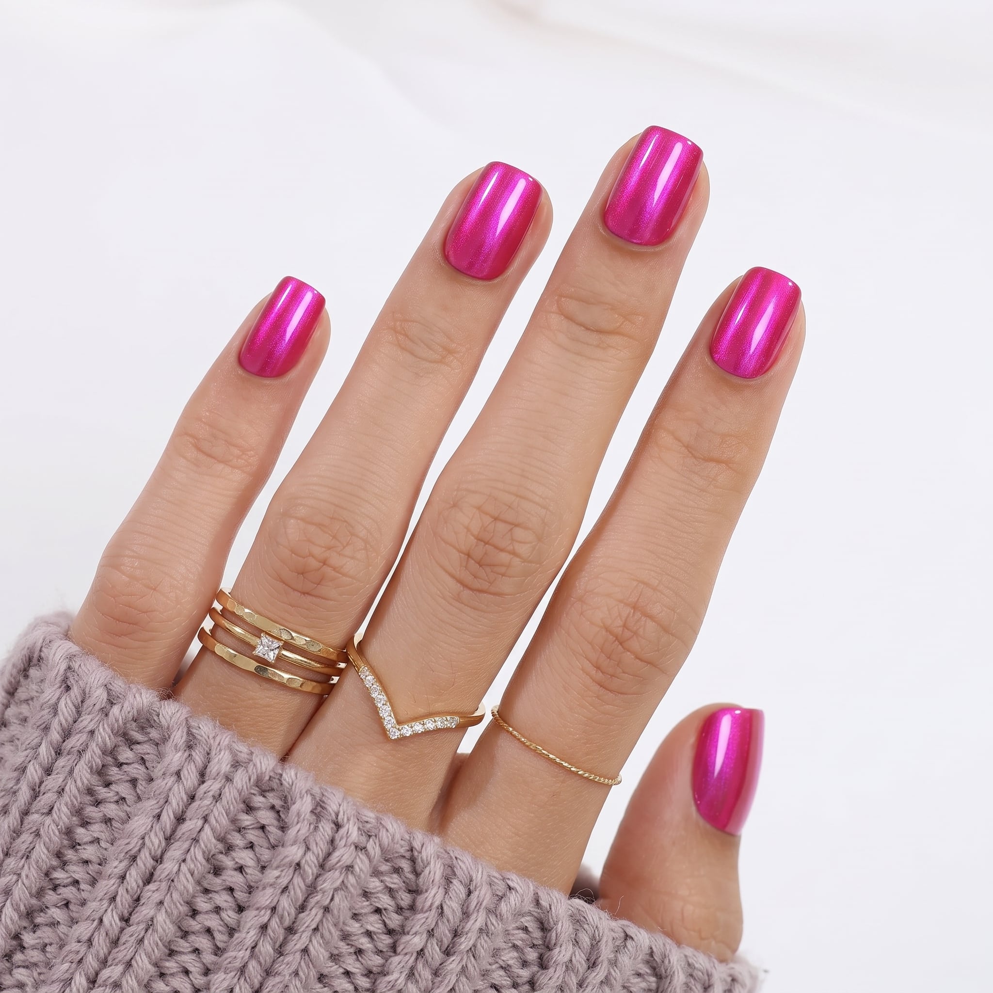 Almond pink nails with soft magnetic shine and glossy finish