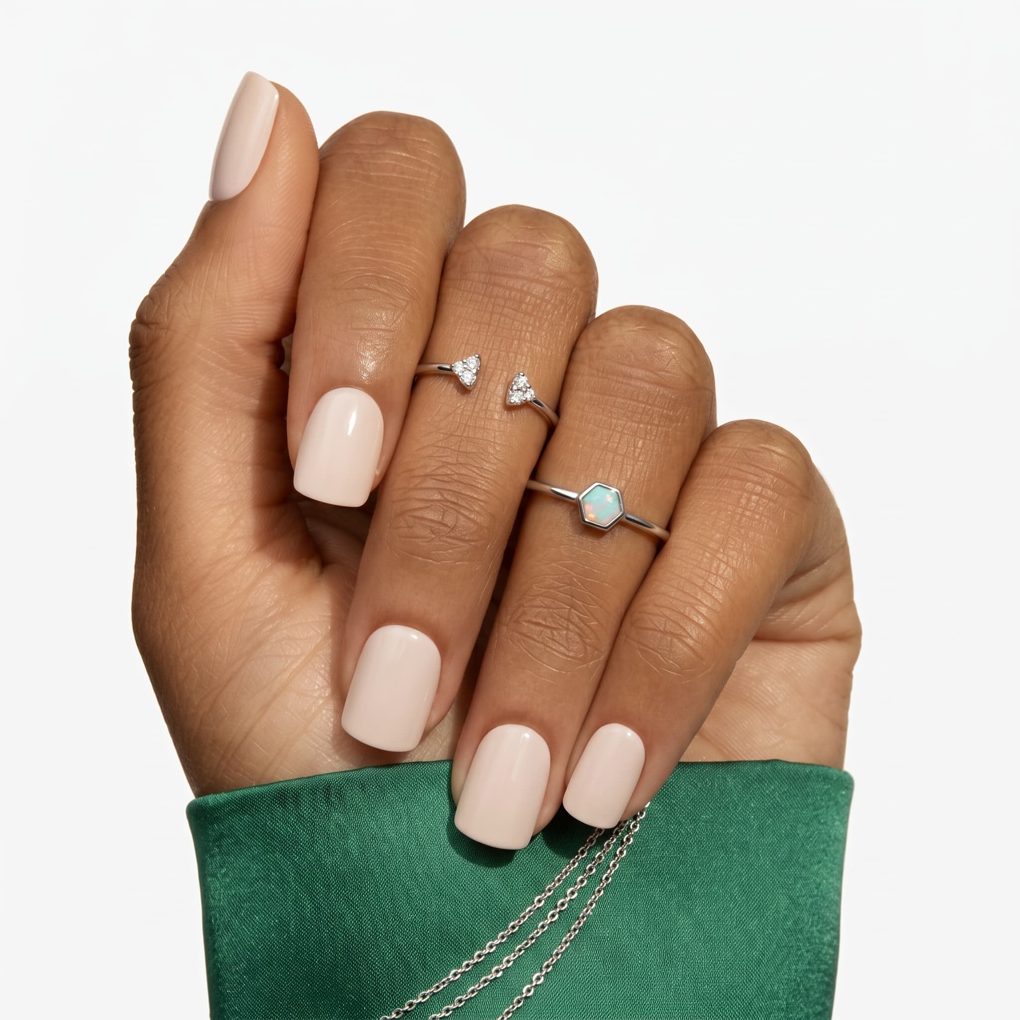 Natural short nails with a soft pale pink glossy finish