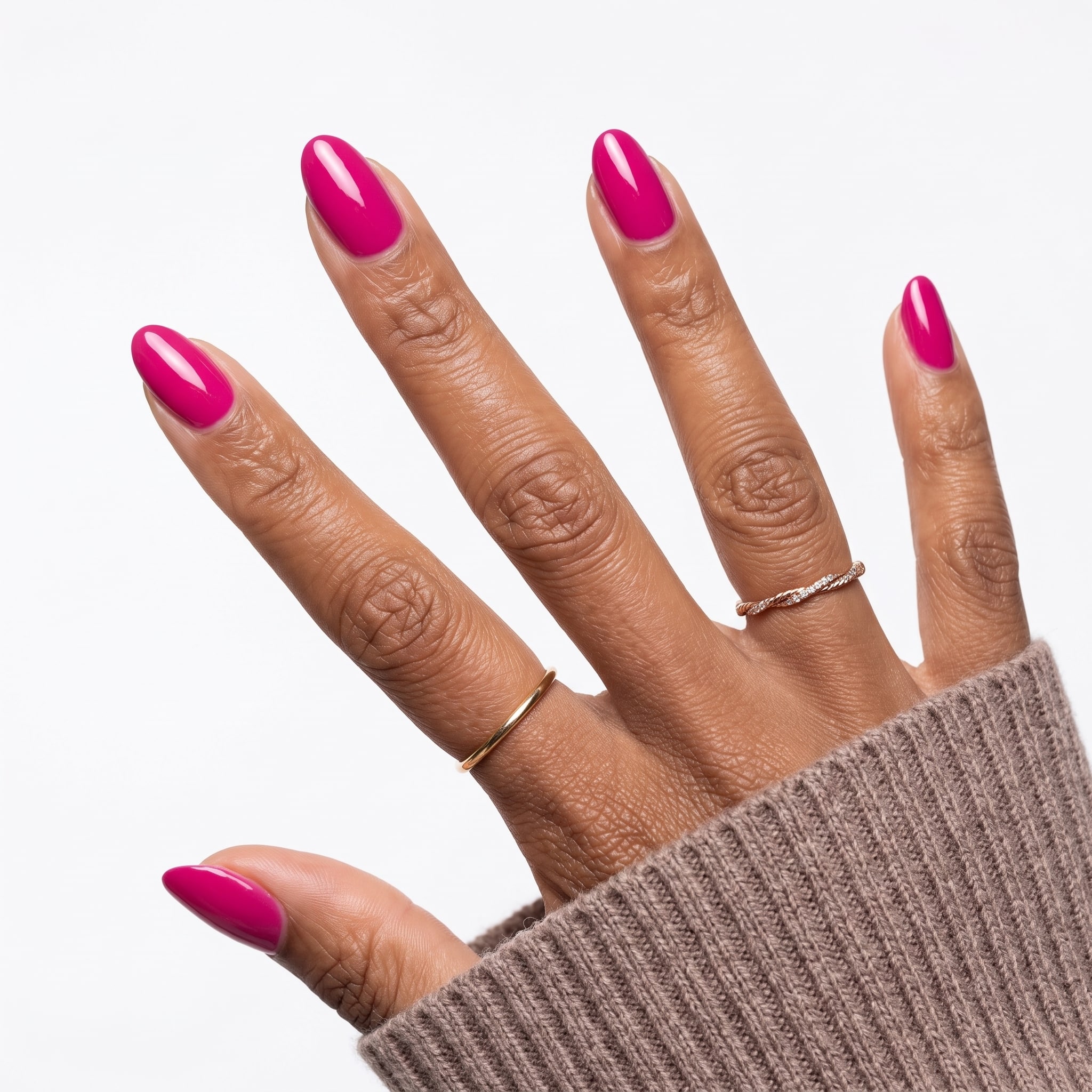Long square electric pink nails with fine gold rings