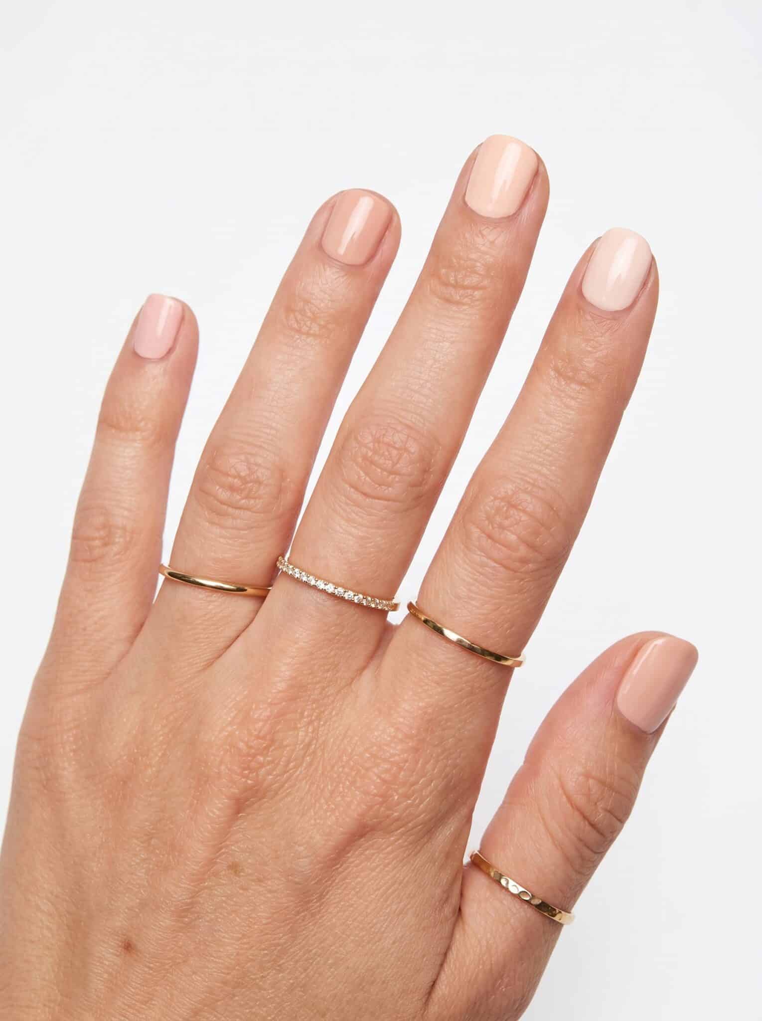 Pearl-inspired soft blush manicure with pale pink shine