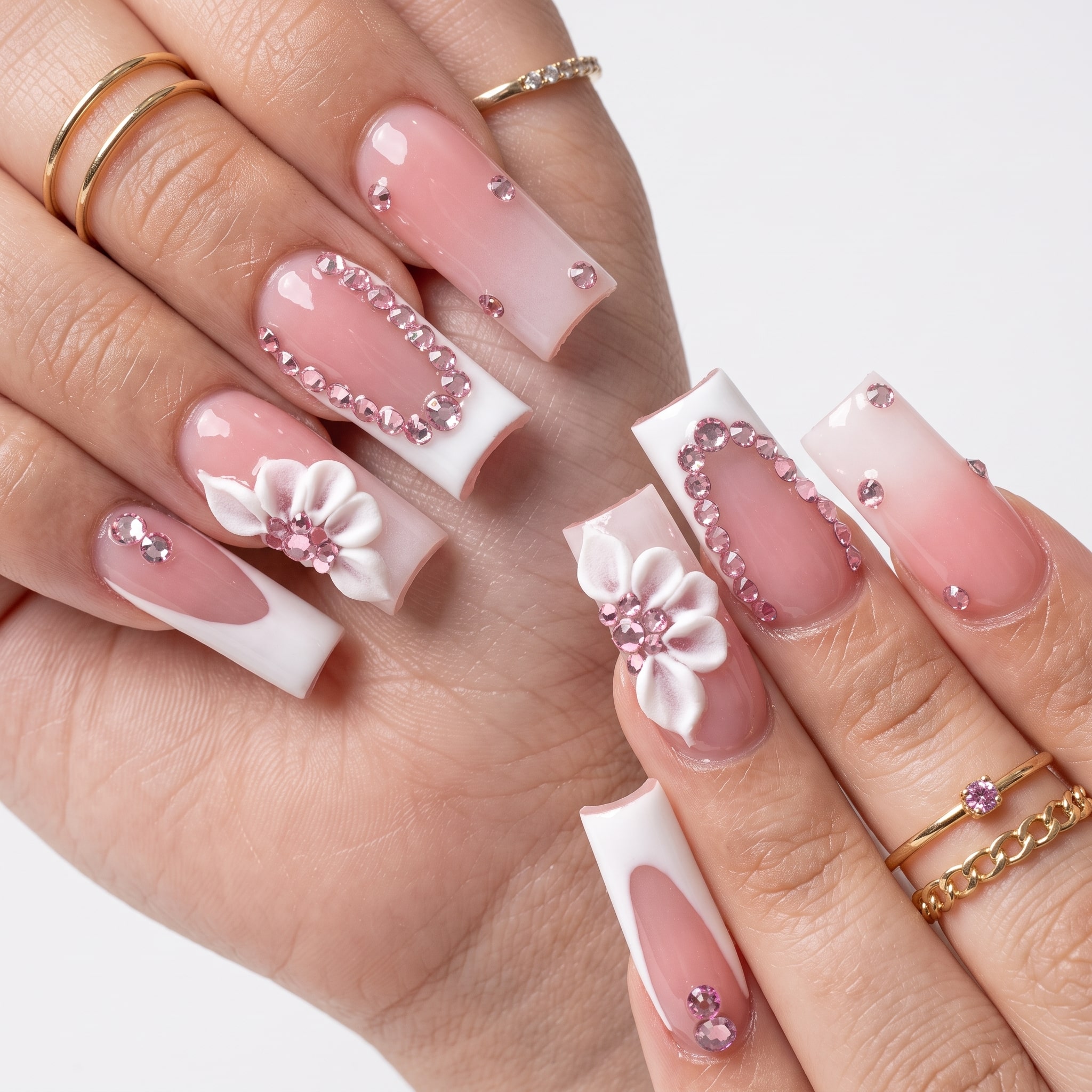 Classic French tips with glossy pink base on almond nails