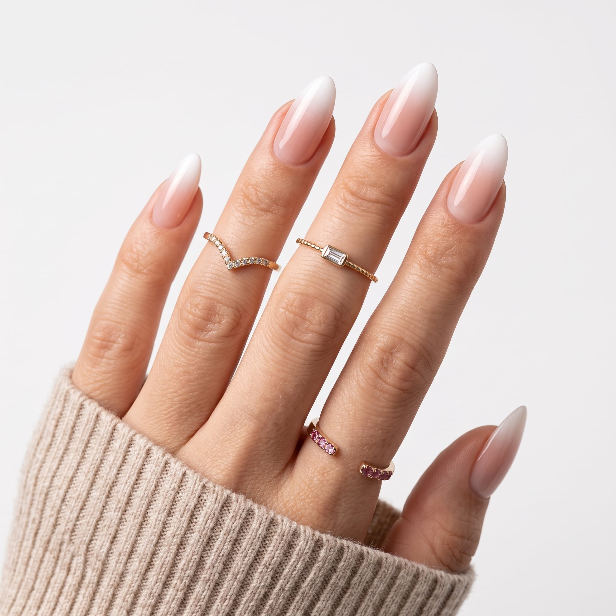 Clean French manicure with a rosy pink base and crisp white tips