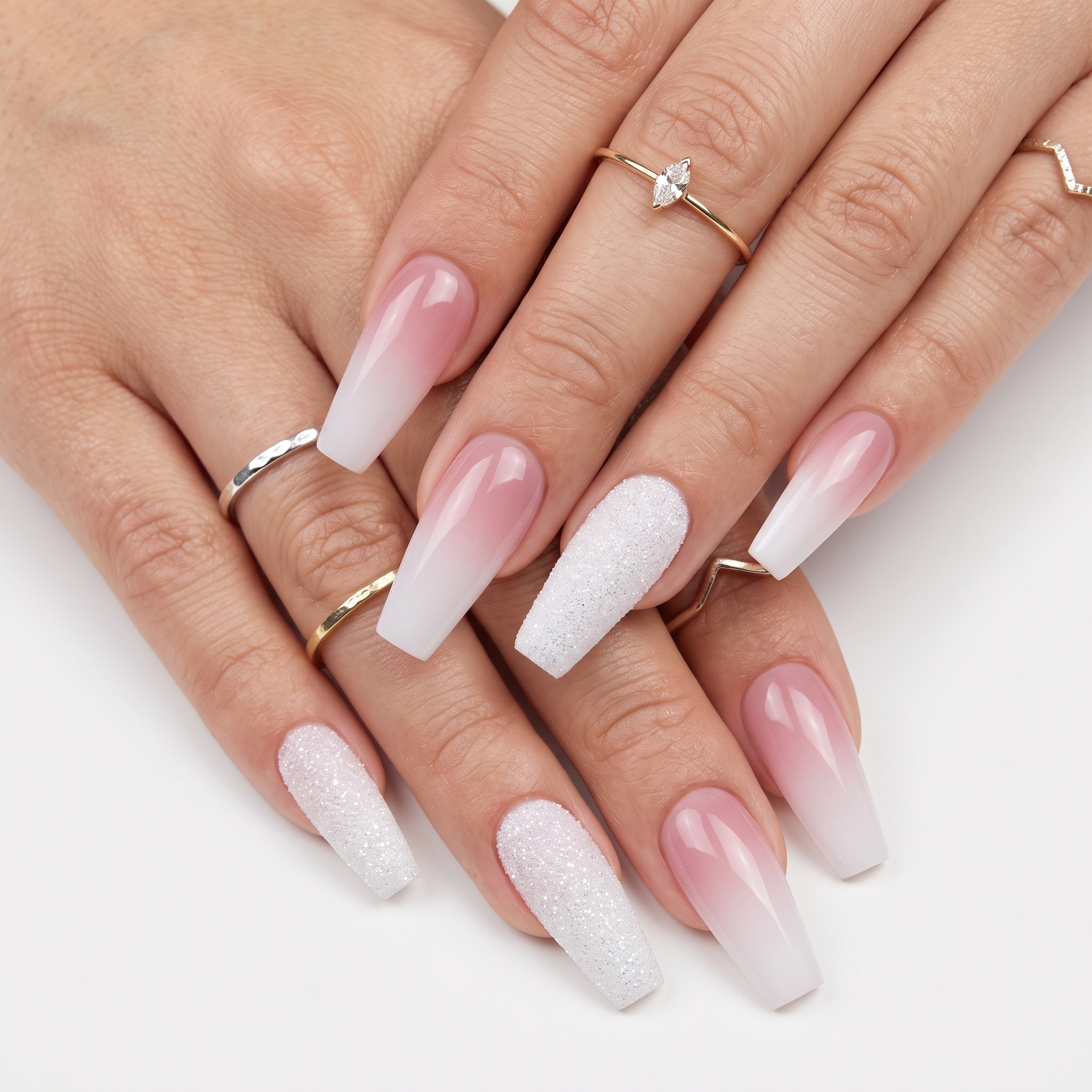 Pearly almond nails with soft pink shine and white French edges