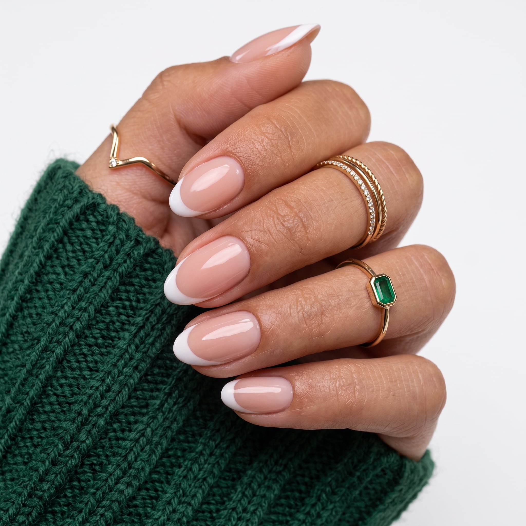 Short micro French manicure with pale pink base and thin white tips