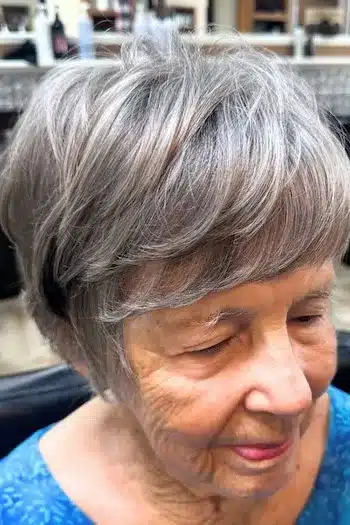 Short Hairstyles for Women Over 70 With Fine Hair - Feathered Gray Pixie Hairstyle