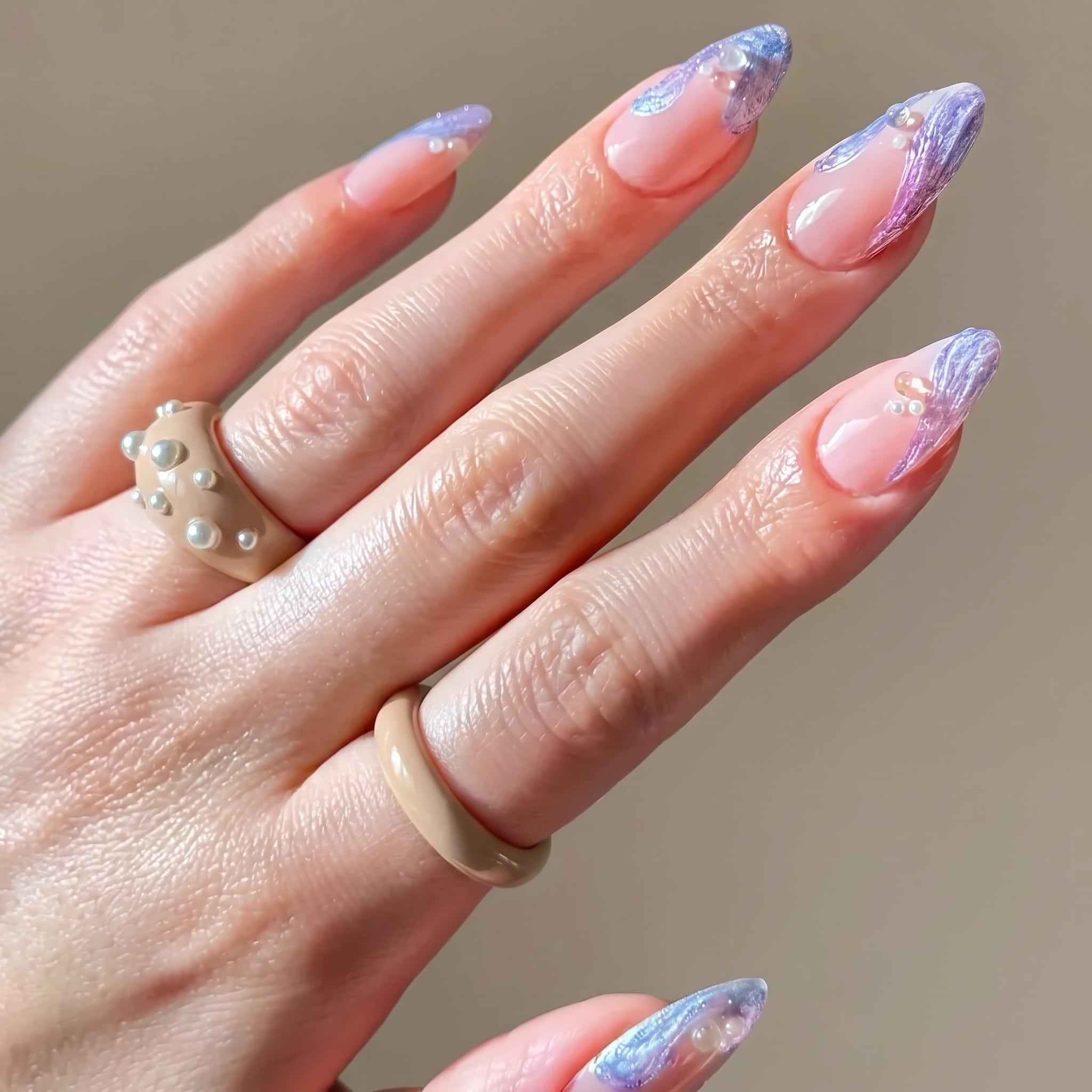 pink iridescent beach barbie manicure with glossy mermaid shell glow