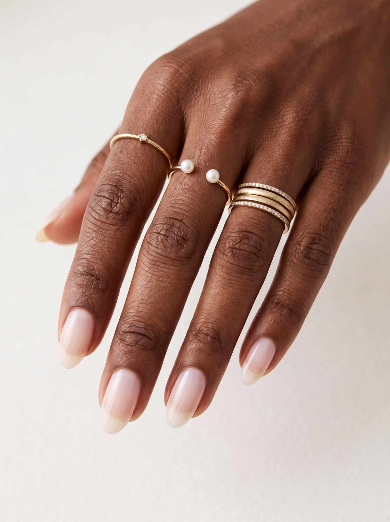 Glossy opaque pastel pink nails with a creamy smooth finish