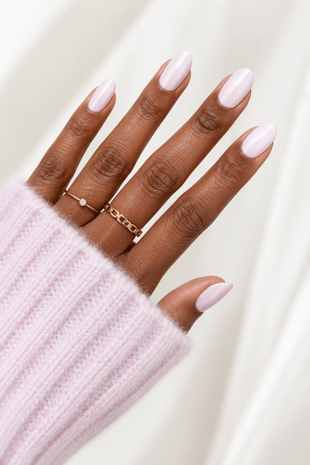 iridescent pearl white nails with glossy shimmer finish