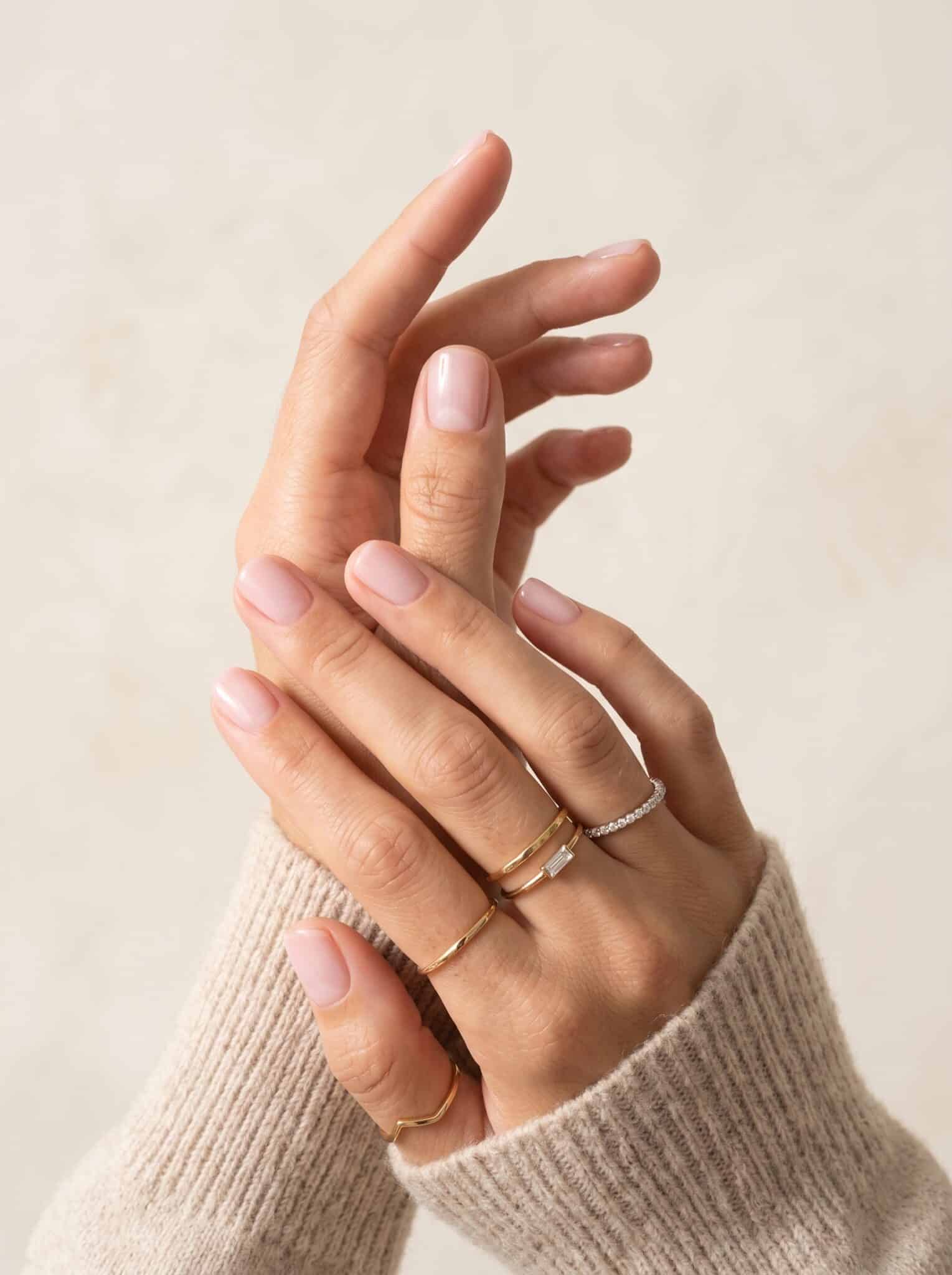 Milky pink short nails with a natural glossy finish