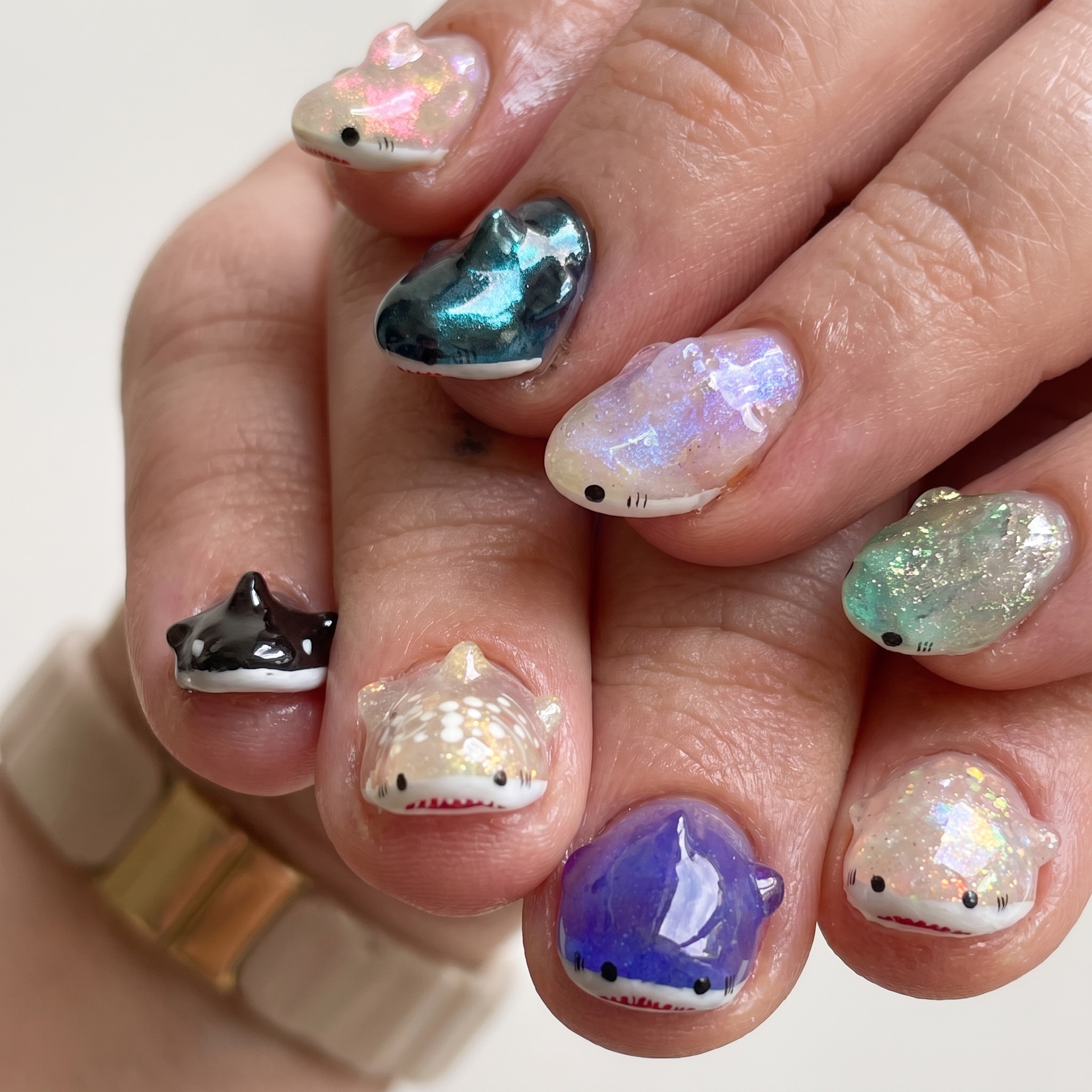 whale shark nails with blue ocean accents and glossy marine texture