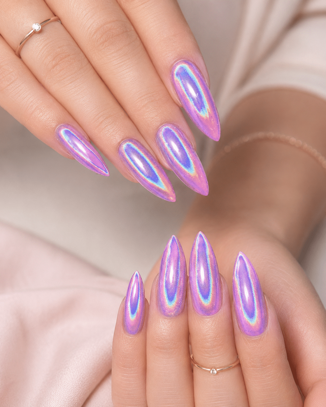Pink chrome aura tips with a futuristic glossy glow