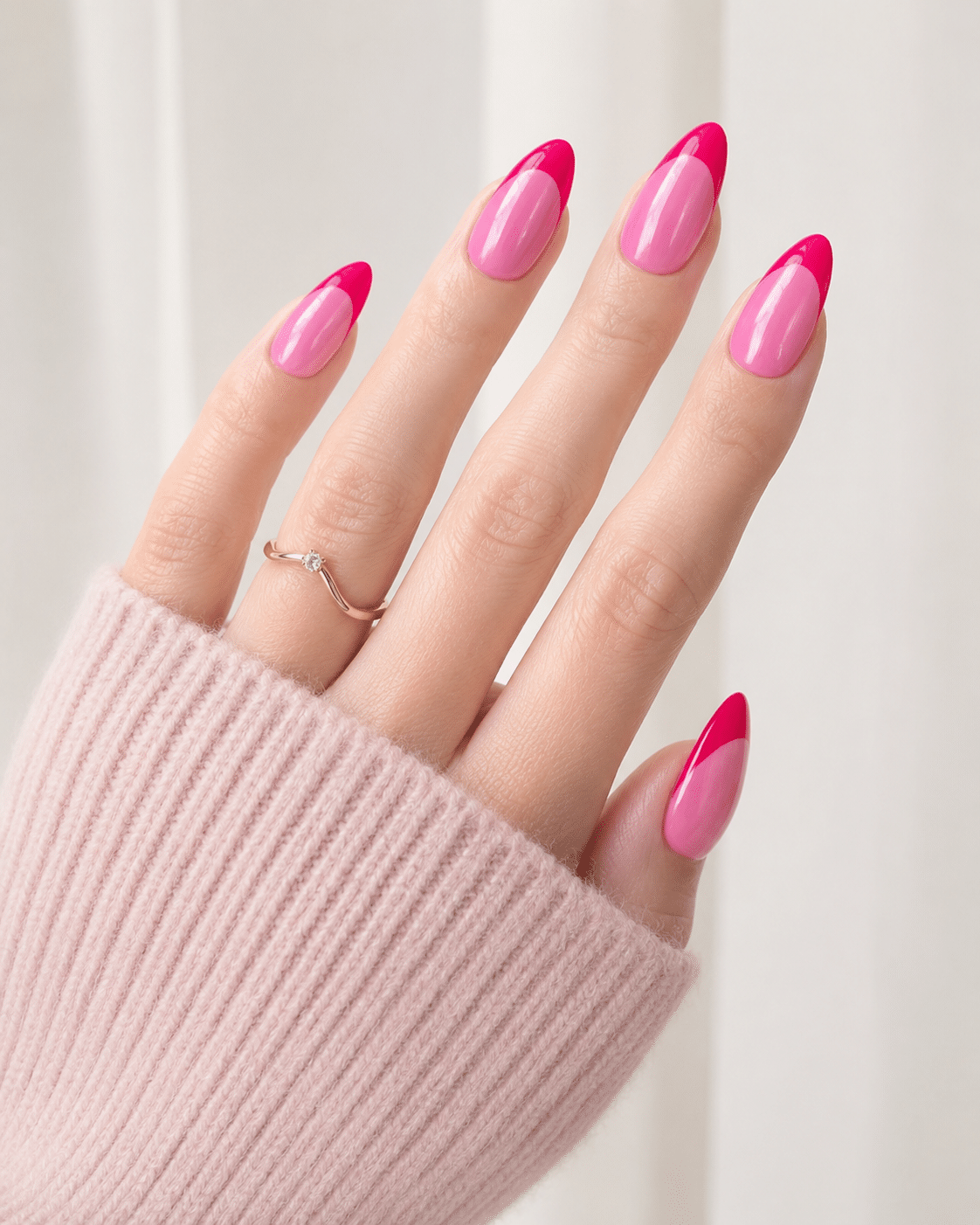 Pink chrome French tips with a clean glossy nude base