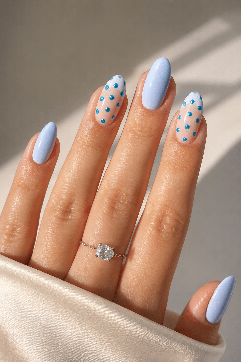 Sea glass blue dot summer nails 2026 with glossy cute nail art
