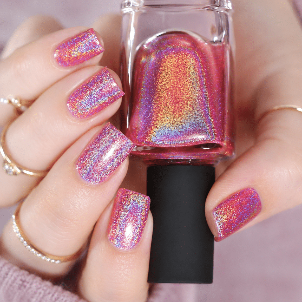 Sheer pink holo jelly nails with a translucent rainbow shimmer