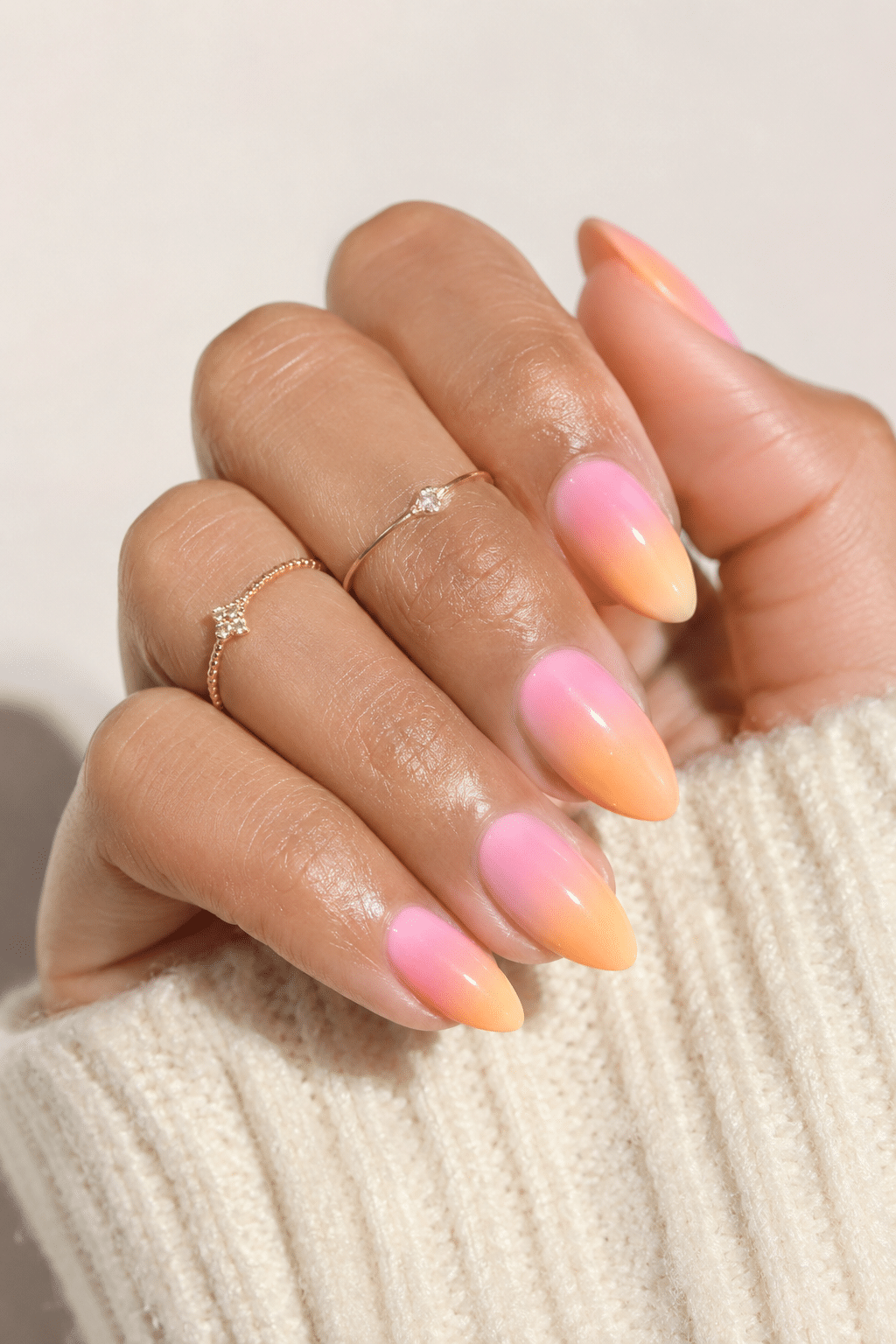 Soft glitter pink summer nails 2026 with glossy sparkle manicure finish