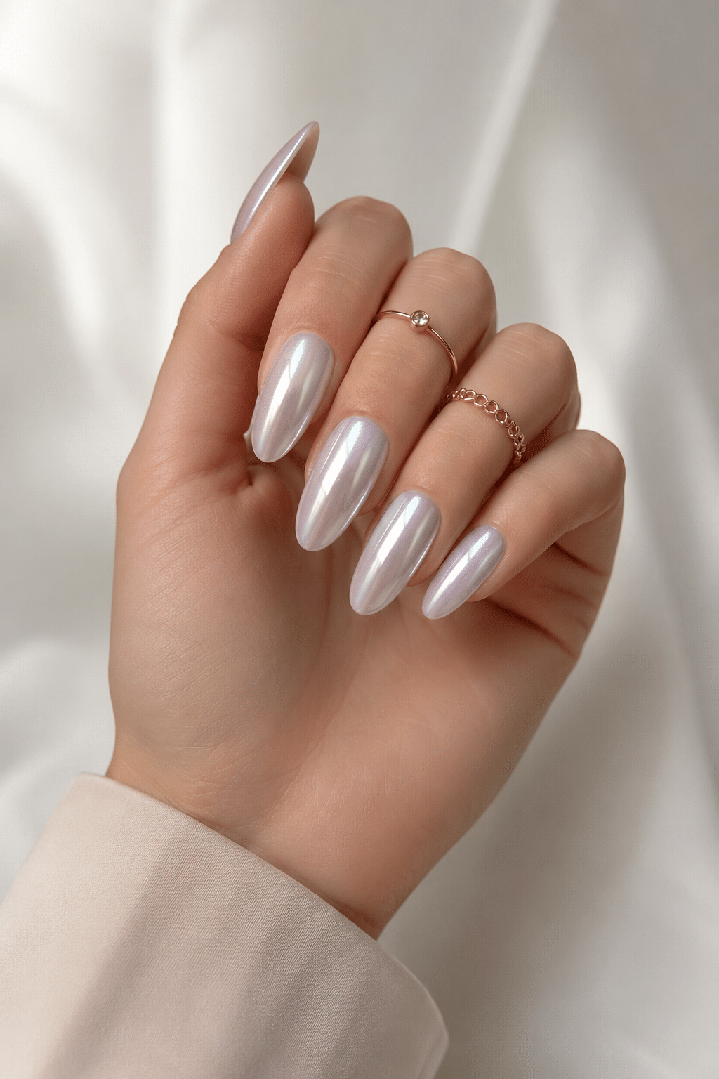 soft pearl white almond nail polish with clean glossy finish