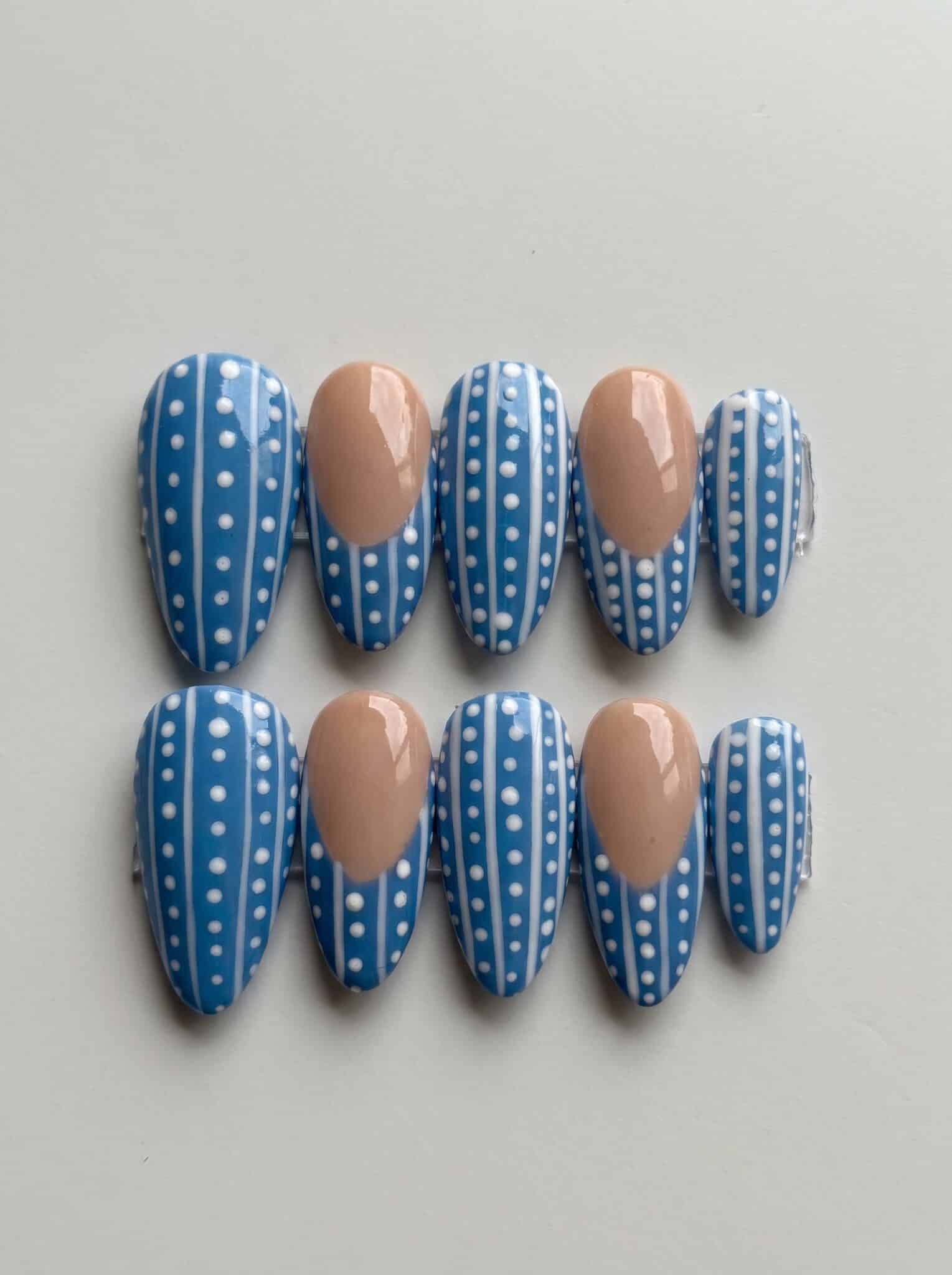 blue spotted shark french press on nail set with nude base
