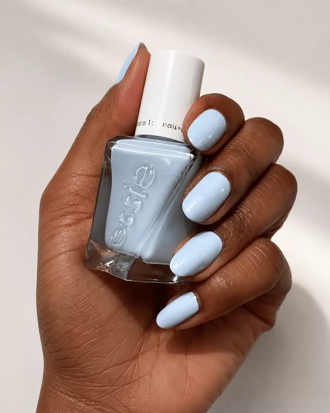 Milky Blue Nail Polish: 10 Soft Manicure Ideas to Try 4 Milky blue polish on short nails and deep skin