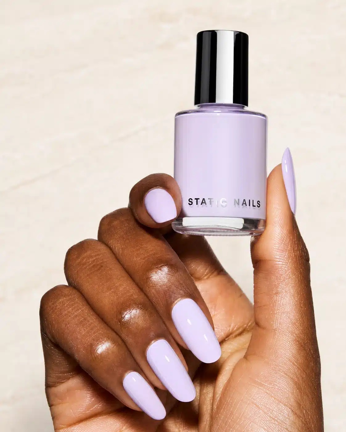 Milky Lavender Nail Polish: Soft Lavender Milk Nails to Try 6 Milky lavender nail polish bottle with soft manicure color