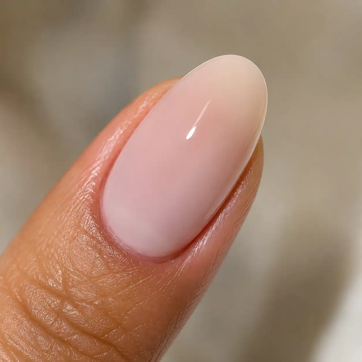 Milky Pink Gel Nail Polish: Soft Jelly Pink Gel Manicure Guide 11 Single nail swatch of milky pink gel nail polish