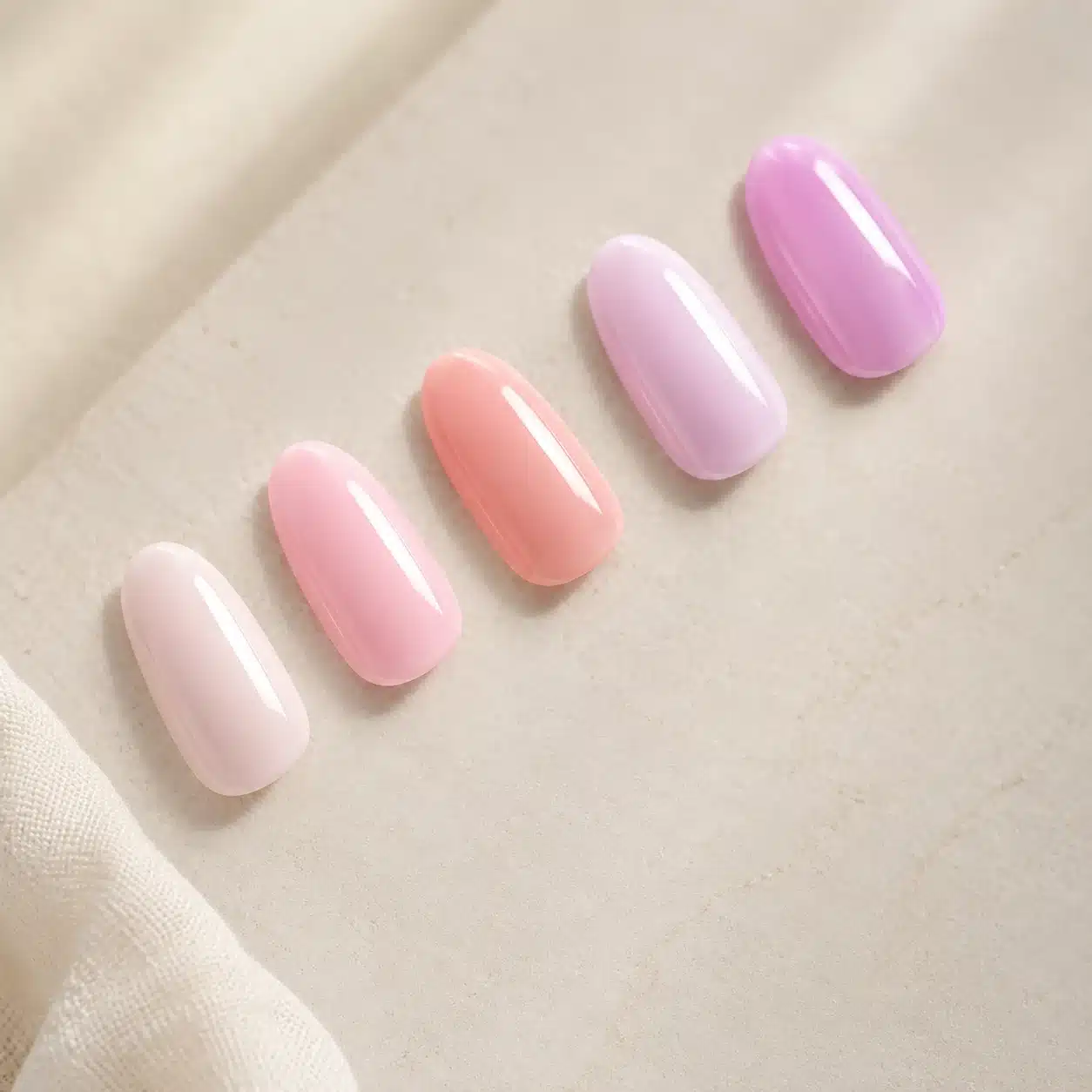 Milky Pink Gel Nail Polish: Soft Jelly Pink Gel Manicure Guide 4 Milky pink gel polish swatch wheel with sheer pink shades