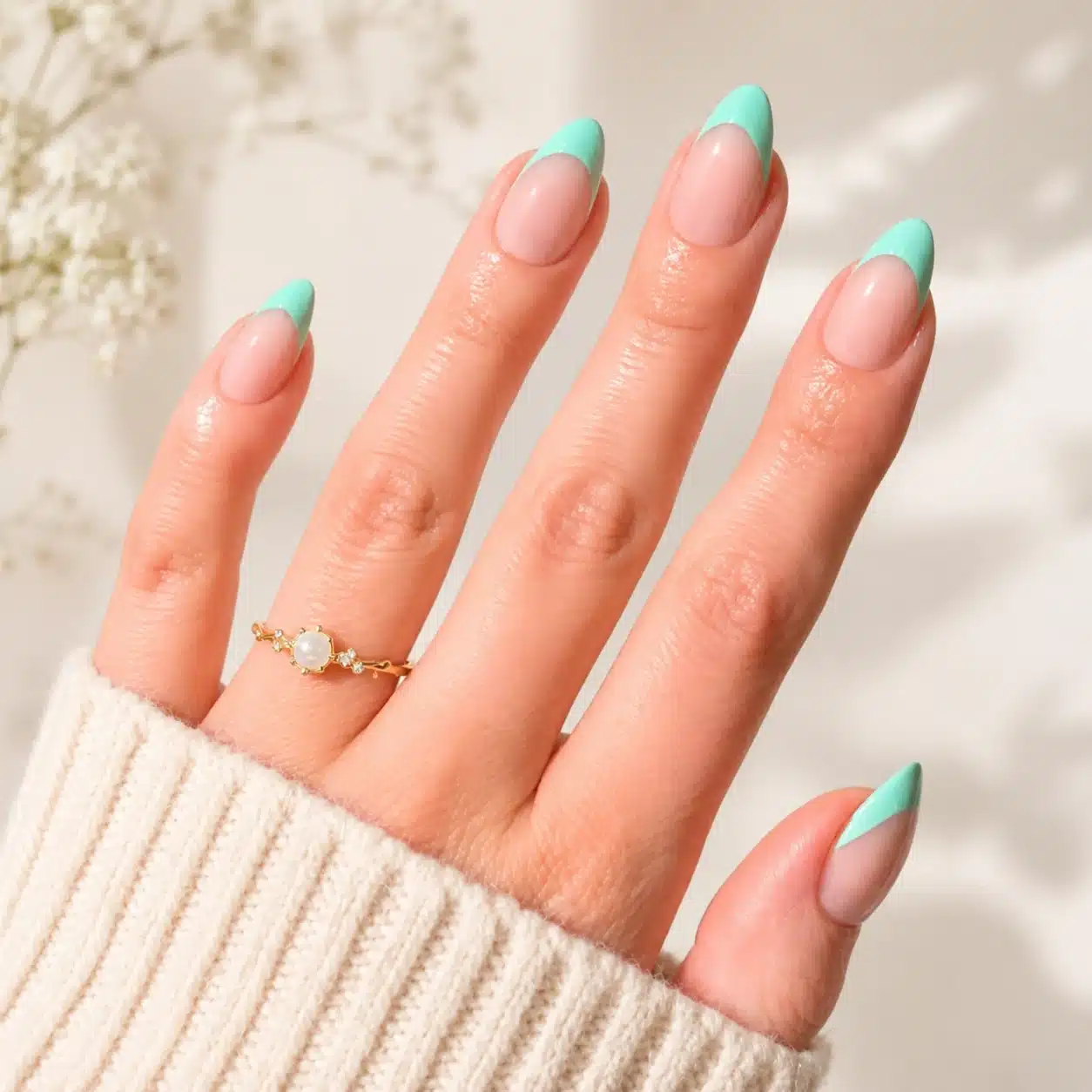 Almond Nail Tips: How to Choose, Size & Apply Them 2 Mint green almond nail tips on a medium-length manicure