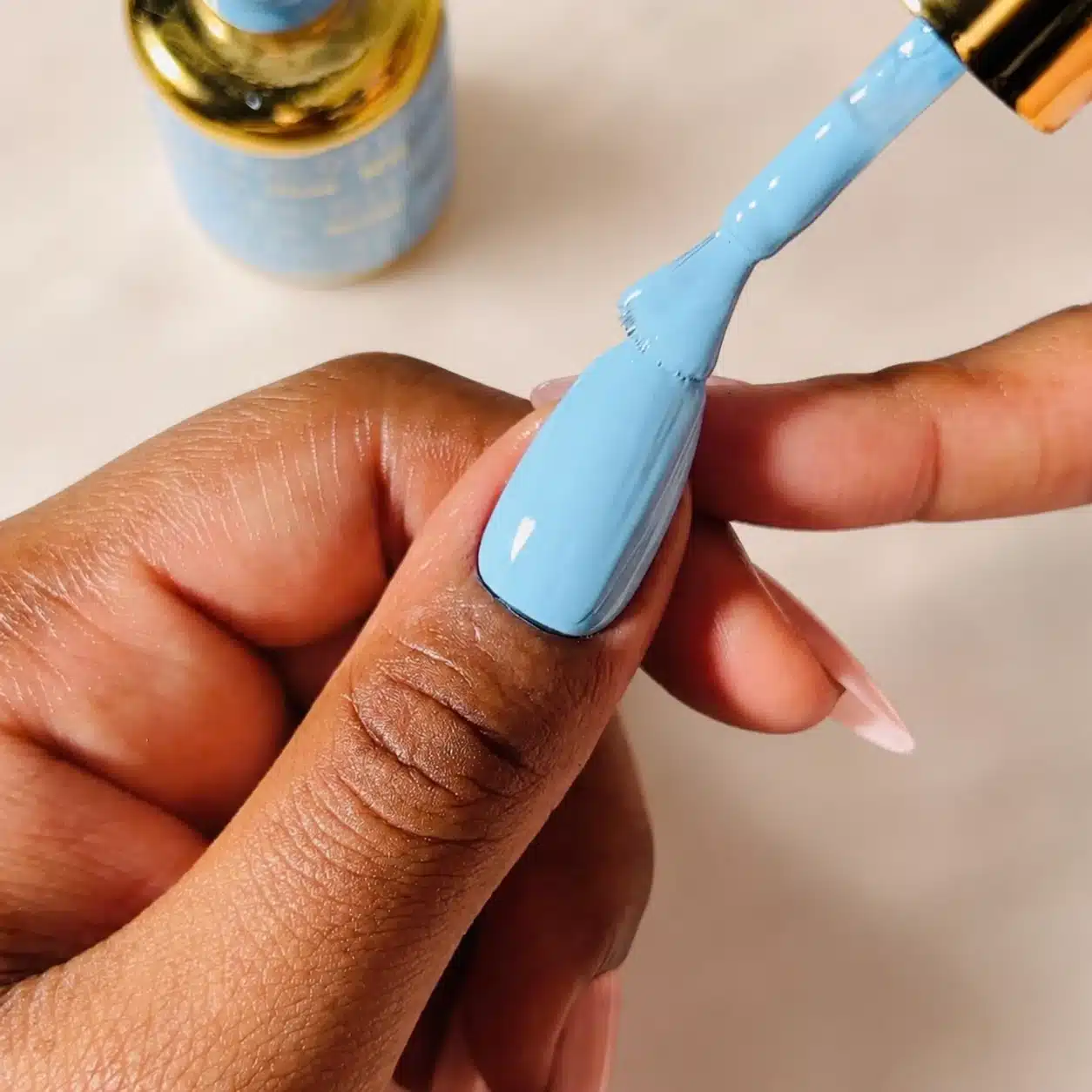 Milky Blue Nail Polish: 10 Soft Manicure Ideas to Try 6 Applying sheer milky blue polish