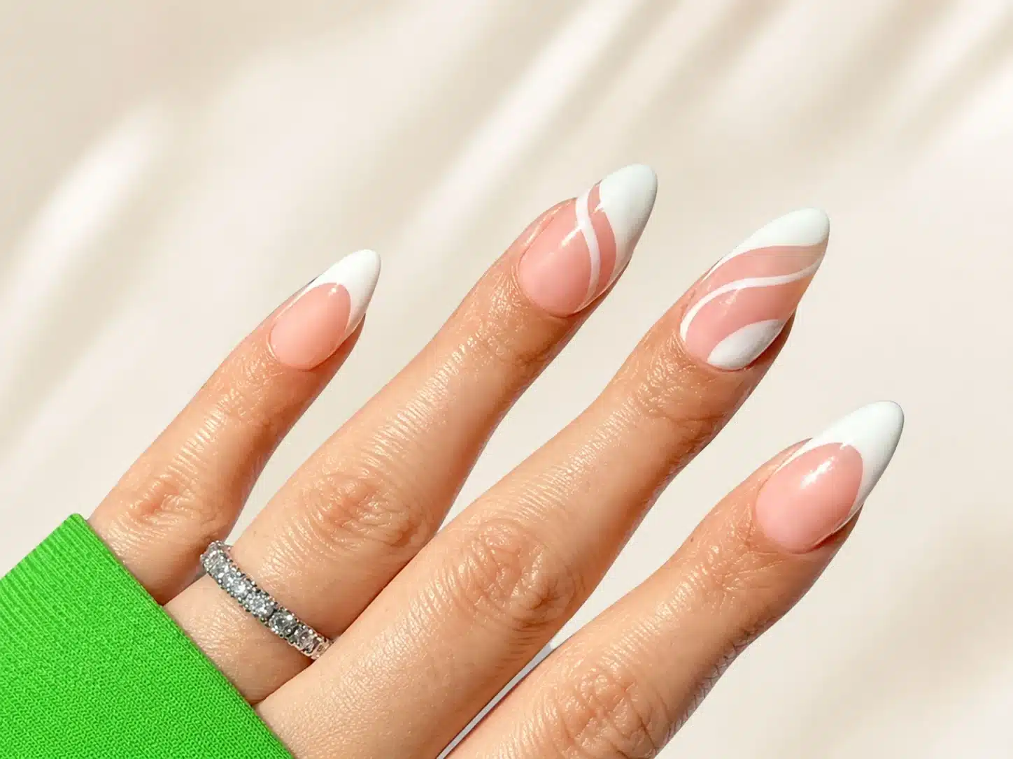 Almond vs Oval Nails: Which Shape Is Best for You? 10 White swirl design on almond shaped nails