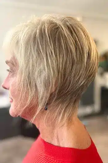 Warm Blonde Tapered Pixie With Long Layers