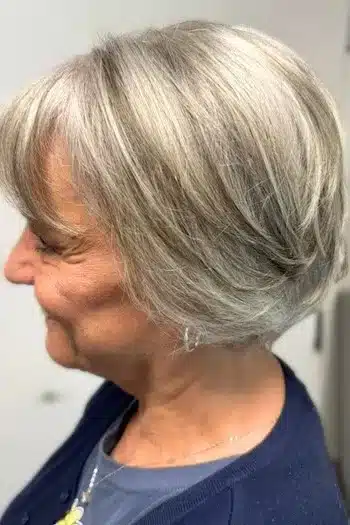 Short Hairstyles for Women Over 70 With Fine Hair - Low-Maintenance Bob With Bangs Hairstyle