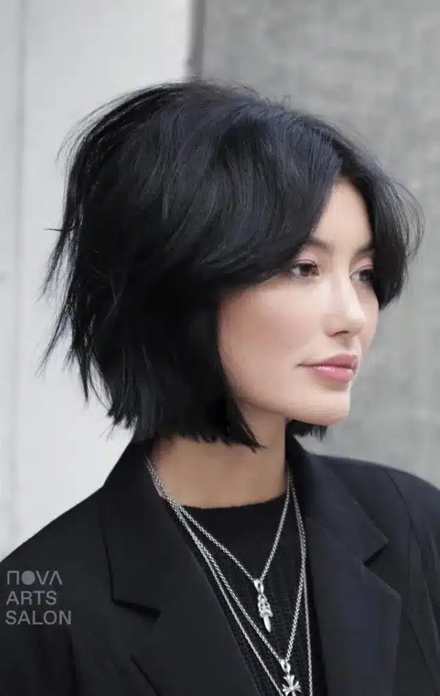 Textured chin bob with piecey ends, featured in the 35 short brown hairstyles you'll be seeing everywhere