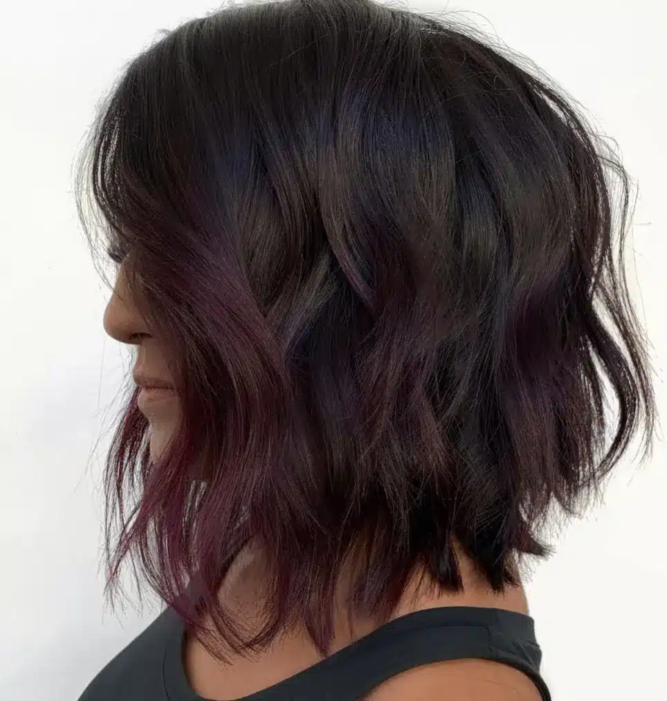Short brown hairstyle with purple undertones, featured in the 35 short brown hairstyles you'll be seeing everywhere
