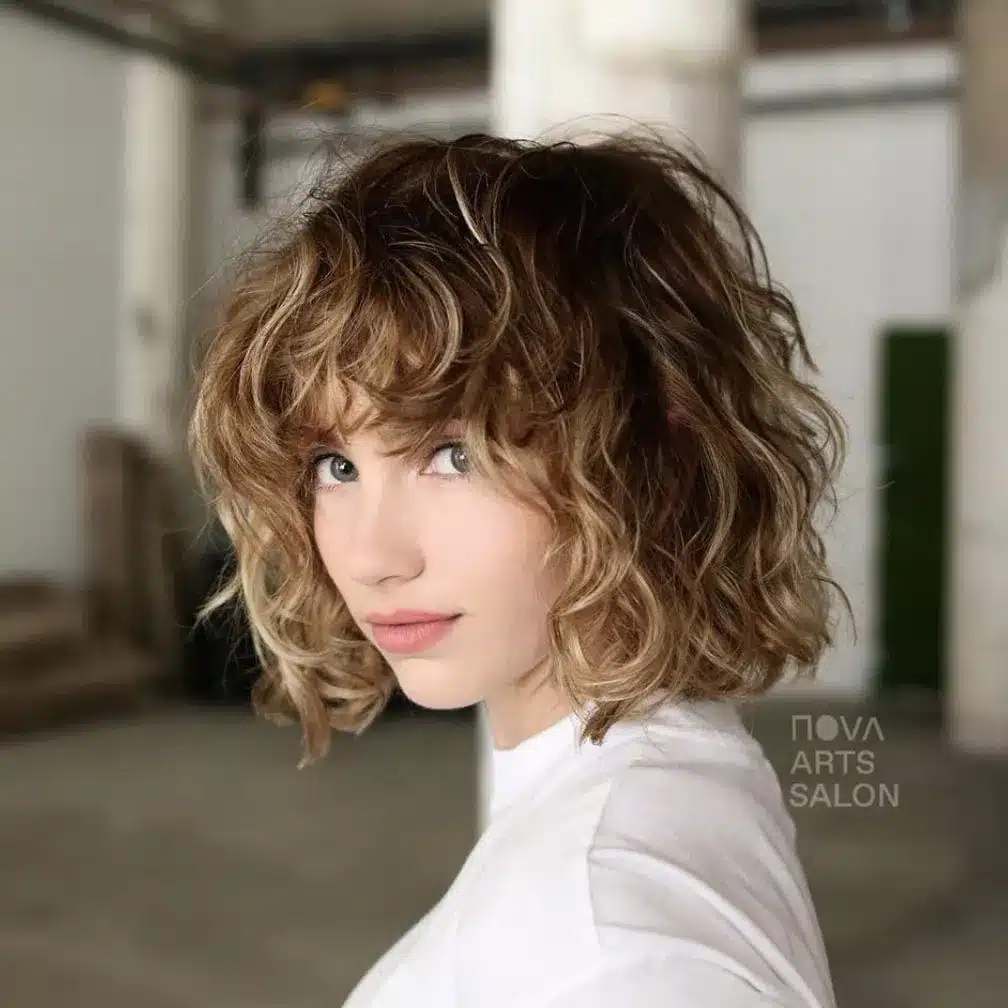 Wavy baby bob with soft curls, part of the 35 short brown hairstyles you'll be seeing everywhere