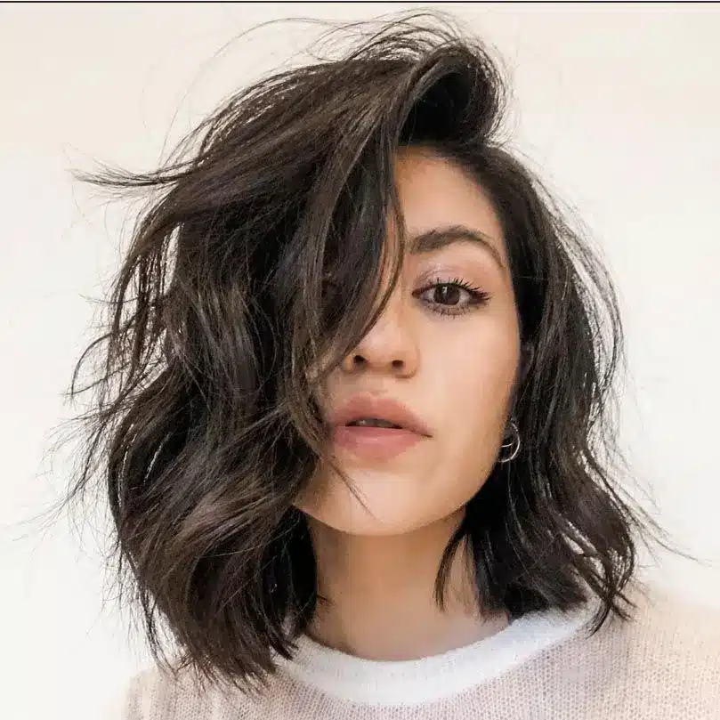 Thick side lob with heavy volume, featured in the 35 short brown hairstyles you'll be seeing everywhere