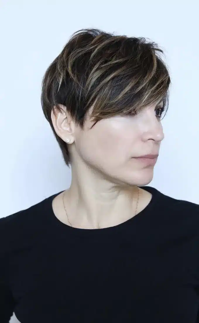 Sideswept crop with textured layers, one of the 35 short brown hairstyles you'll be seeing everywhere