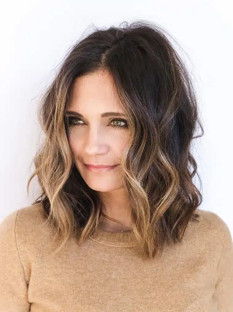 Balayaged shoulder cut with warm tones, part of the 35 short brown hairstyles you'll be seeing everywhere