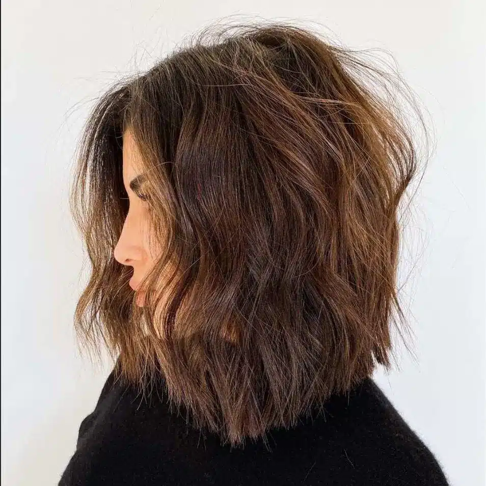 Thick blunt lob with straight-across ends, featured in the 35 short brown hairstyles you'll be seeing everywhere