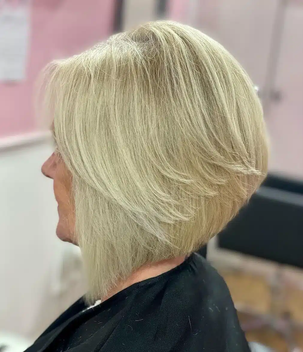 Light blonde long stacked bob with feathered layers