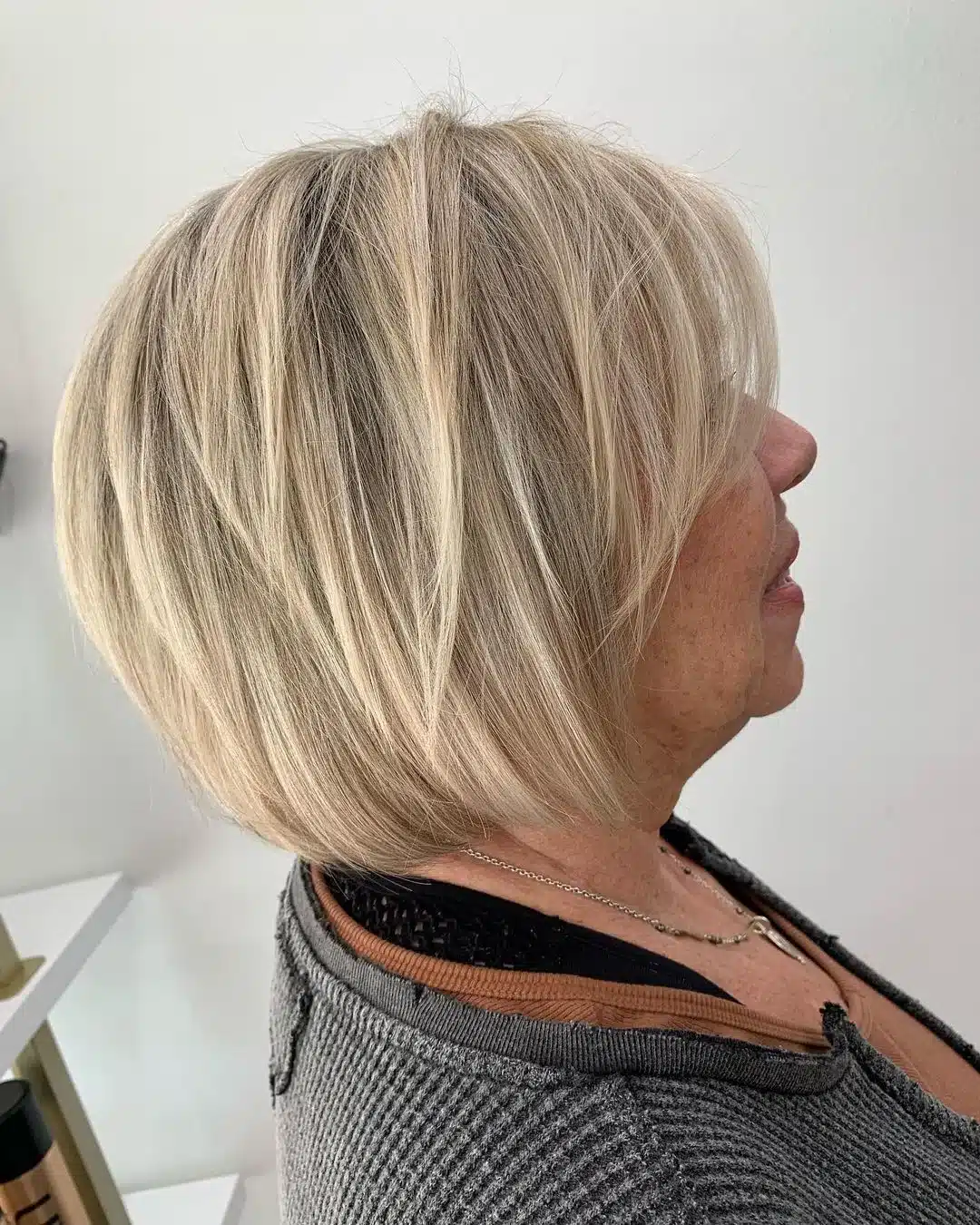 Classic bob with textured layers and long side swept bangs