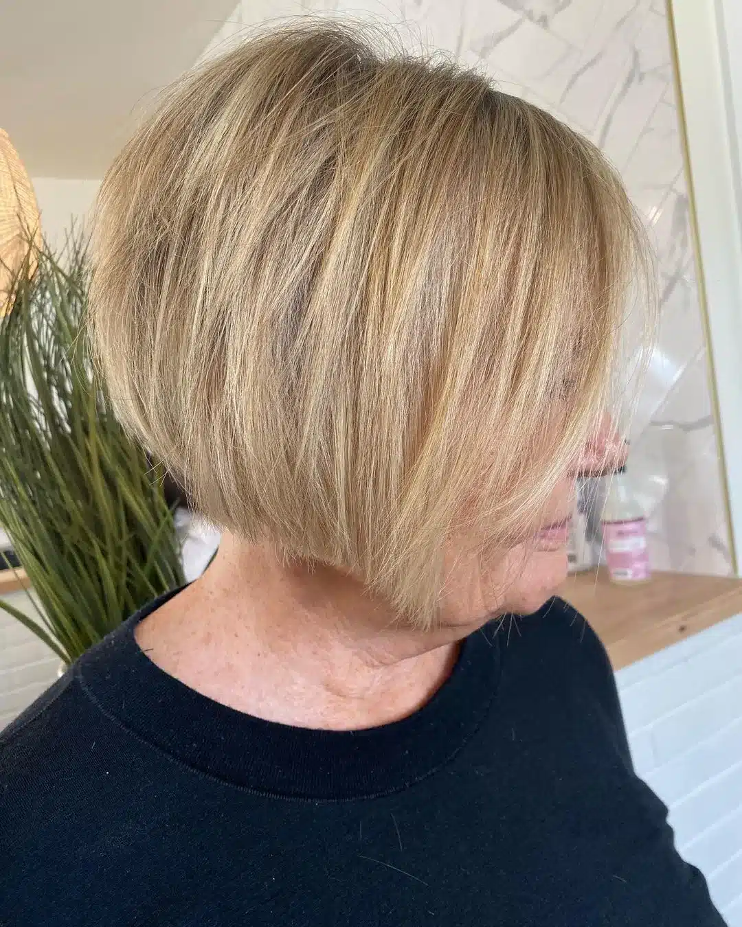 Chin length golden blonde bob for older women