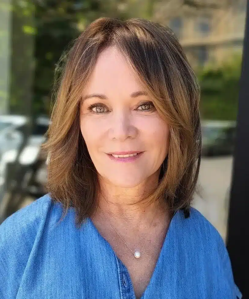 30 Trendiest Bob Haircuts for Older Women 1 Brown balayage bob with soft curtain bangs