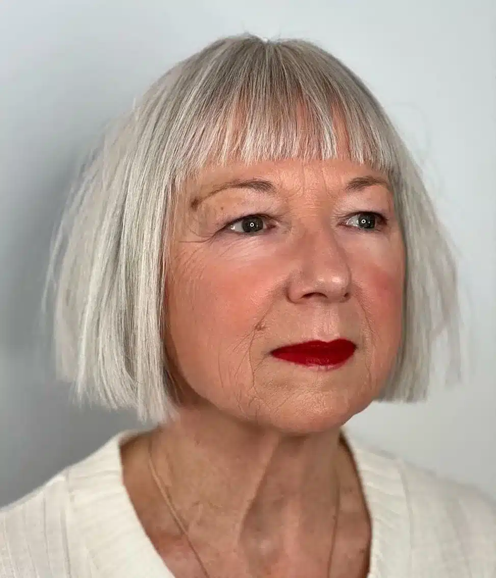 30 Trendiest Bob Haircuts for Older Women 3 Short gray bob with thin baby bangs
